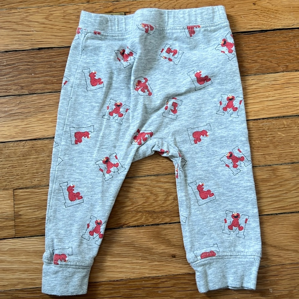 NWOT H&M grey Elmo pants, size 6-9M. Never worn